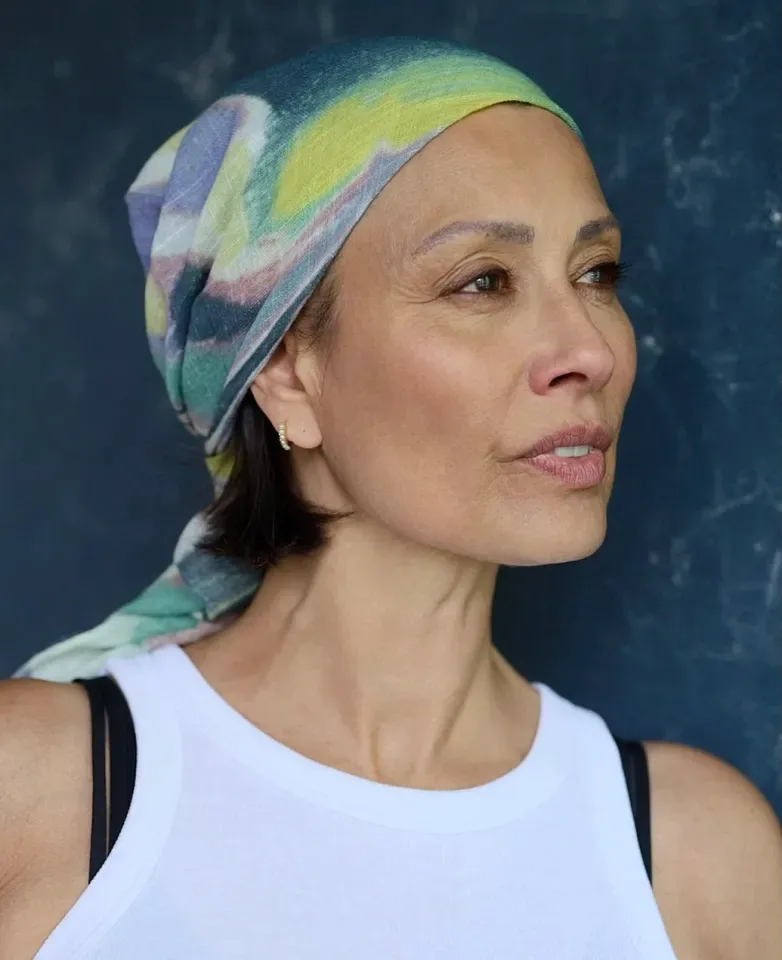 Melanie Sykes with a colorful headscarf.